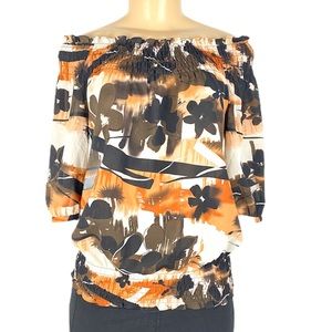 The Limited elastic hem off shoulder flora…